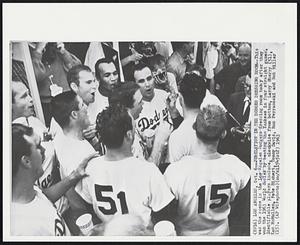 Jubilation in the Dodger Dressing Room--This was the scene in the Los Angeles Dodgers dressing room today after they won the 1963 World Series by beating the Yankees in four straight games. Identifiable players include, clockwise from bottom, Larry Sherry (51), Ken McMullen, Pete Richert, Tommy Davis, Ron Perranoski and Bob Miller (15).