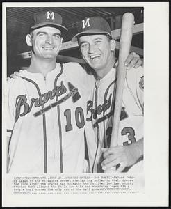 Winning Smiles--Bob Buhl (left) and Johnny Logan of the Milwaukee Braves display big smiles in their dressing room after the Braves had defeated the Phillies 1-0 last night. Pitcher Buhl allowed the Phils two hits and shortstop Logan hit a triple that scored the only run of the ball game.