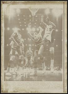 Rebound Battle--Bob Boozer, right, Chicago Bulls, goes up for a rebound with one foot extended, as San Francisco Warriors Rudy LaRusso (35) battle Boozer for the ball in the first half of last night's National Basketball Association game in Chicago. Warriors from left are, Nate Thurmond (42), Jeff Mullins (23) and Fred Hetzel (44). Warriors won, 116-106.