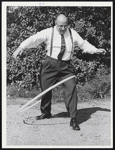 Don Carr, manager, F.W. Woolworth, Wollaston Branch, President Wollaston Businessmens’ Association, with hula hoop