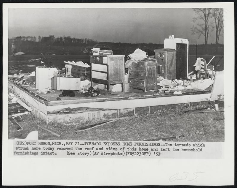 Tornado Exposes Home Furnishings--The tornado which struck here today removed the roof and sides of this home and left the household furnishings intact.