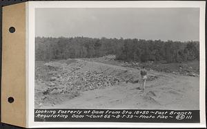 Contract No. 66, Regulating Dams, Middle Branch (New Salem), and East Branch of the Swift River, Hardwick and Petersham (formerly Dana), looking easterly at dam from Sta. 18+50, east branch regulating dam, Hardwick, Mass., Aug. 7, 1939