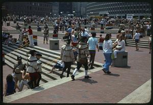 A group of people, some in colonial costume, Boston City Hall Plaza