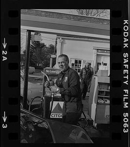 Verne Noyes at gas pump