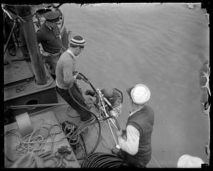 A diver going in the water