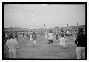 Women playing volleyball