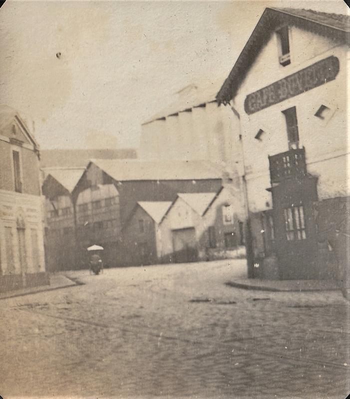 Street scene and cafe, probably Ypres, Belgium