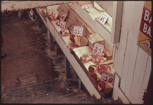 Meat and price tags on shelf