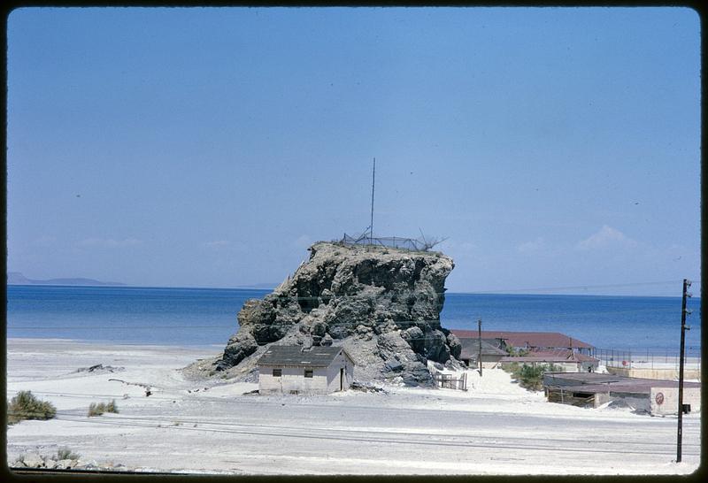 Black Rock and buildings on shore of Great Salt Lake, Utah