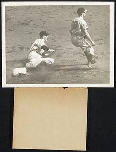 Ruppert Blitzkrieg Rolls on Yankee First Baseman Babe Dahlgren slides safely into third base in the third inning of the second World Series Games in New York, Oct. 5, when Pitcher Monte Pearson's sacrifice bunt advanced him from second. The Bronx Bombers rolled over the Reds from the Rhineland 4-0, giving them two straight wins. Pearson allowed the National League champions only two hits.