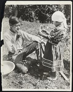 Hold it Still Now - Shaving Time in Glacier National Park, Montana - the Old Bow-and-Arrow Indians Used Tweezers to Keep Their Faces Clean, but the Younger Generation uses the Razor. (Hold 'at Pan Still, Sis!)