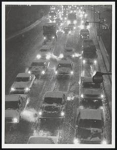 Traffic x-way -- south at South station. Weather storms snow