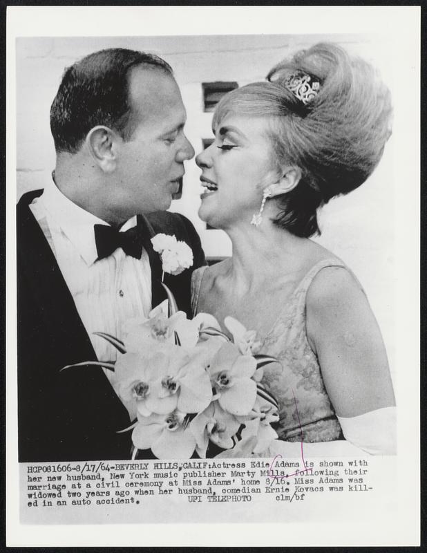 Actress Edie Adams is shown with her new husband, New York music publisher Marty Mills, following their marriage at a civil ceremony at Miss Adams' home 8/16. Miss Adams was widowed two years ago when her husband, comedian Ernie Kovacs was killed in an auto accident.