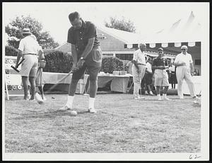 An unidentified player stands at the starting yesterday’s start of a two-day tournament on Nantucket Island in summer society’s new revival of the great game of the Gay 90’s-croquet.