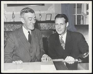 Saltonstall and Tobin Confer. Gov.-Elect Maurice J. Tobin (D) and Gov. Leverett Saltonstall (R) are shown in the executive office. At the State House in Boston today (Nov. 28) where they met to familiarize Tobin with the routine affairs of the Governor’s office.