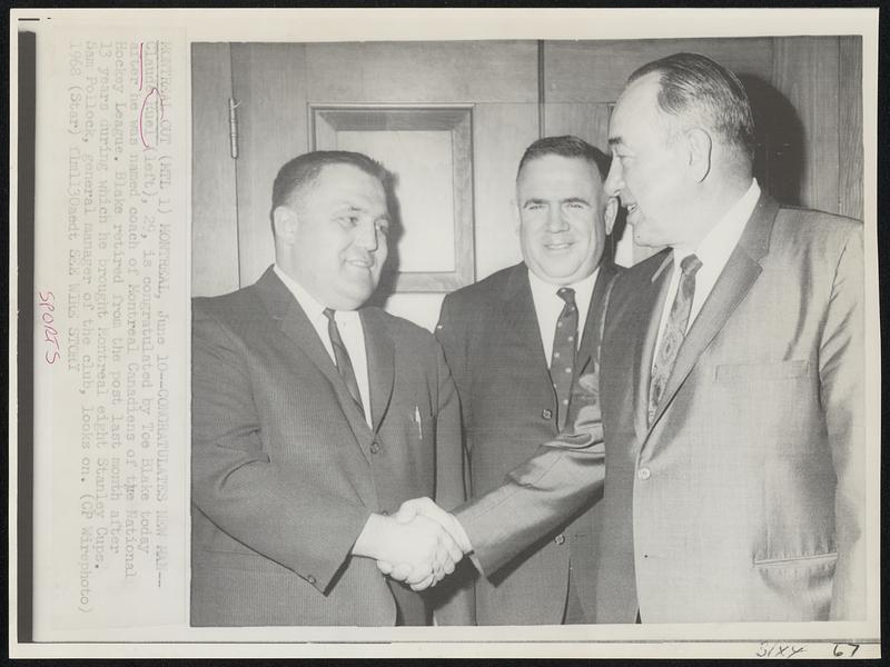 Montreal Out. Montreal, June 10 – Congratulates New Man – Claude Ruel (left), 29, is congratulated by Toe Blake today after he was named coach of Montreal Canadiens of the national Hockey League. Blake retired from the post last month after 13 years during which he brought Montreal eight Stanley Cups. Sam Pollock, general manager of the club, looks on.