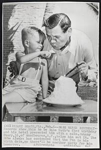 Babe Marks Birthday -- Records show, this to be Babe Ruth's 53rd birthday and his hotel presented him with a cake. johnny Every, 3 1/2, of Woodbourne, N.Y., helps him eat it. The Babe always has contended that the 7th is his birth date, so there'll be another party for him tomorrow.