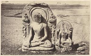 Two sculptures of Buddhas with damaged faces found at Konch, India