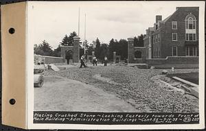 Contract No. 56, Administration Buildings, Main Dam, Belchertown, placing crushed stone, looking easterly towards front to Main Building, Belchertown, Mass., Sep. 14, 1938