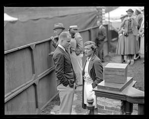 An unidentified man and woman in conversation