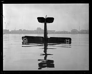 Airplane sinking into Charles River