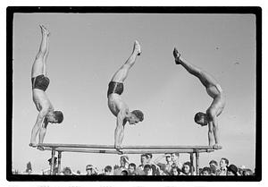 Gymnasts on parallel bars