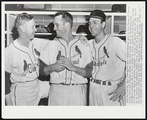 St. Louis – Happy Red Birds – Smiles are on the faces of these three Cardinal players after they did their part in defeating the Brooklyn Dodgers by a 3 to 0 score at Busch stadium last night. Rookie Righthander Larry Jackson (center) pitched his second win of the season as he handed the Dodgers their first shutout of the season. Red Schoendienst (left) and Rookie Ken Boyer each hit home runs to help out the victory for the Red Birds.