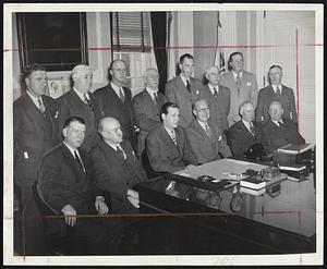 To Study State Department of Commerce-This group met at the State House yesterday to organize for the purpose of investigating Gov. Tobin’s request for a state department of commerce. Back row, left to right-Rep. Arthur J. Sheehan, Rep. John Henry Carroll, Senator J. Austin Peckham, Senator Cornelius F. Haley, Rep. Charles Gibbons, Rep. Dowd, Ralph E. Flanders, Gov. Tobin, Joseph P. Kennedy, Edward J. Stewart, and James T. Dowd, Ralph E. Flanders, Gov. Tobin, Joseph P. Kennedy, Edward J. Stewart, and James T. Moriarty.