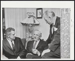 Baseball Talk -- Bob Scheffing, (left) Chicago Cubs manager, and BIll Rigney (right) manager of the San Francisco Giants, listen to Casey Stengel, New York Yankees, discuss spring training plans as they appeared here last night for the annual Modesto Reds Baseball Banquet.