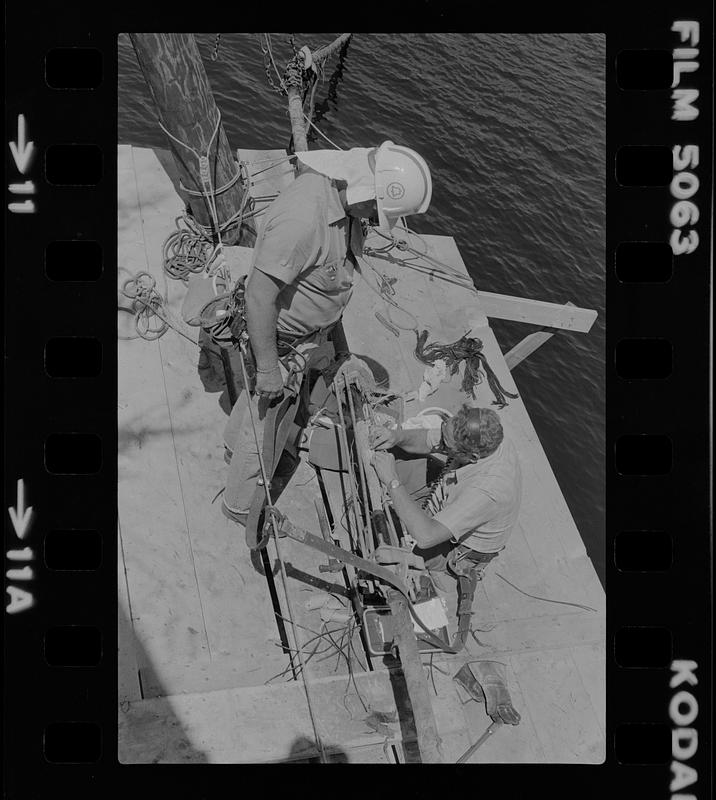 Telephone company underwater cable repair at Deer Island