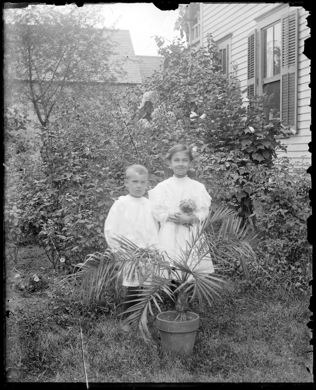 Boy and girl in a garden