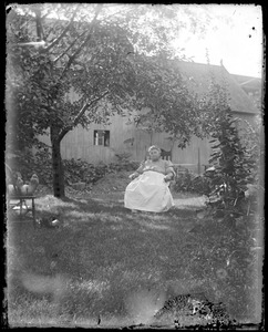 Franziska Wilhelm sitting in a yard