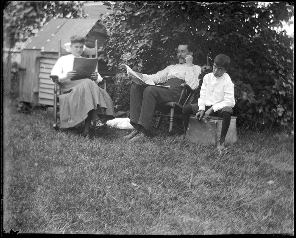 C.R. Wilhelm with his daughter and son in their backyard