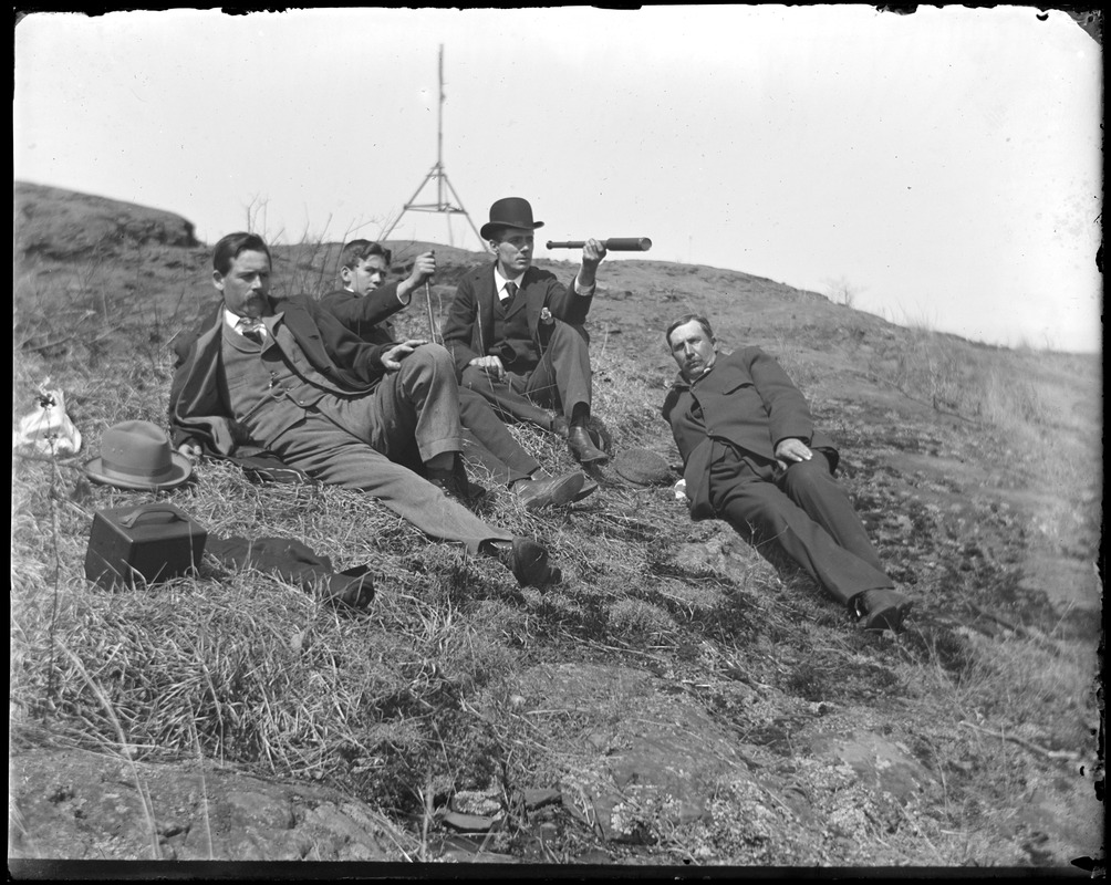 Surveyors on a hillside