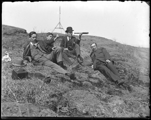 Surveyors on a hillside