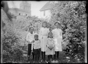 Wilhelm children and Elsie Schenker in the Wilhelm's back yard