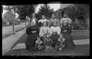 Group portrait in a front yard