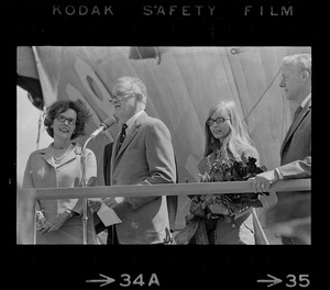 David S. Lewis, head of General Dynamics, speaking at christening ceremony for the USS Mount Vernon while Mrs. Barry J. Shillito, far left, looks on