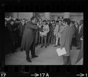 Pianist Norm Blum, who gave a concert the night before, argues with occupiers of president's office at MIT