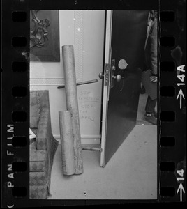 Battering ram of heavy steel pipe was used to break open door to office of MIT president