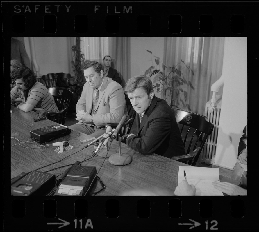 B.U. President John Silber speaks at a press conference after riots