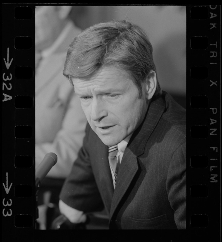 B.U. President John Silber speaks at a press conference after riots