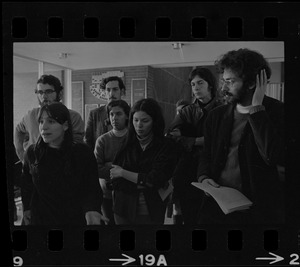 Brandeis University students gathered and listening during protests