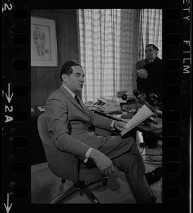 Brandeis University President Morris Abram at his desk and conducting press conference during student protest