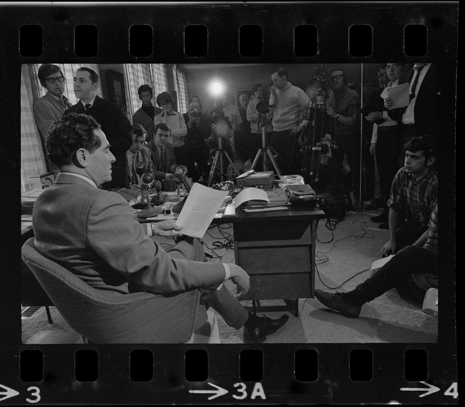 Brandeis University President Morris Abram at his desk and conducting press conference during student protest