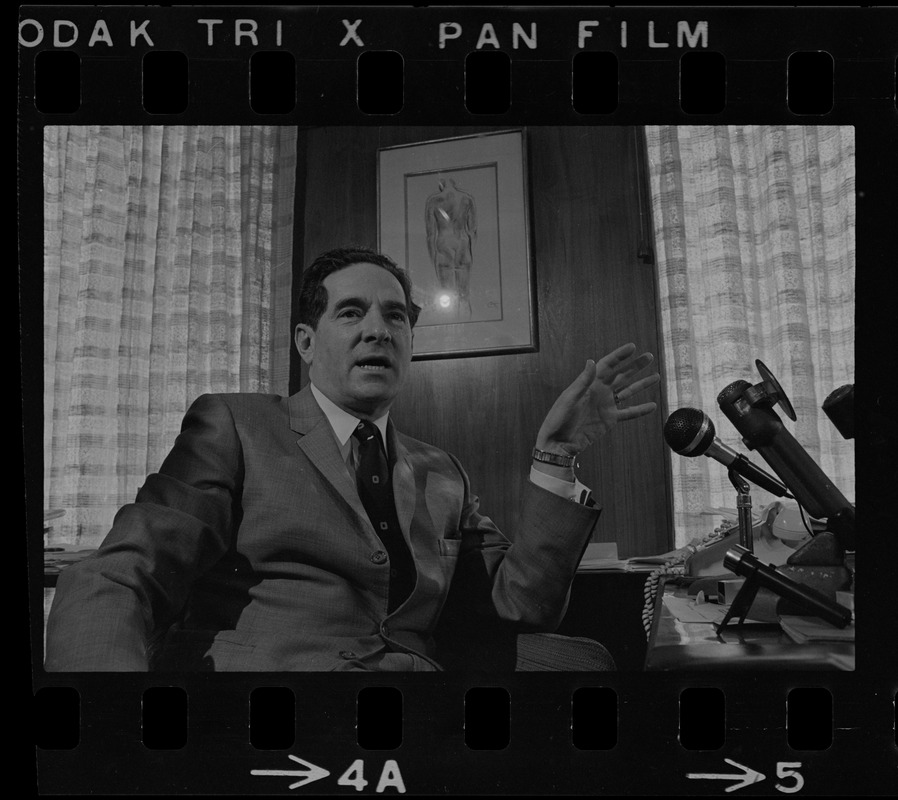 Brandeis University President Morris Abram conducting a press conference in his office during sit-in