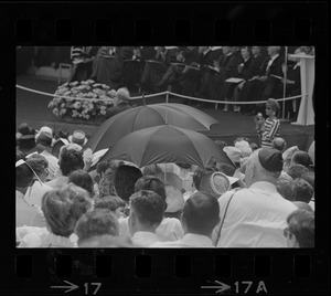 Umbrellas were the order of the day at the Brandeis commencement, but for sun protection, not rain