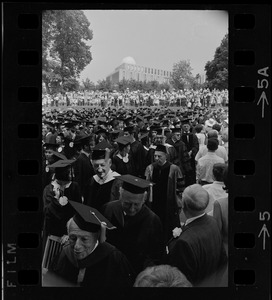 Faculty procession along an aisle during Brandeis University commencement