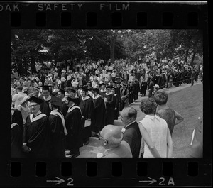 Faculty procession along an aisle during Brandeis University commencement
