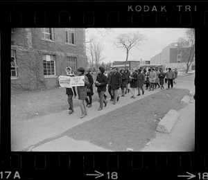 Demonstrators from Boston University express their support of the Brandeis Black students outside Ford Hall